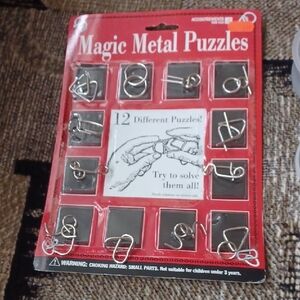 4/$30 Magic Metal Puzzles Set - Silver